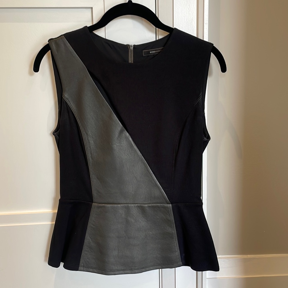 BCBG Peplum cotton and leather top, slit on chest. Super sexy and flattering.